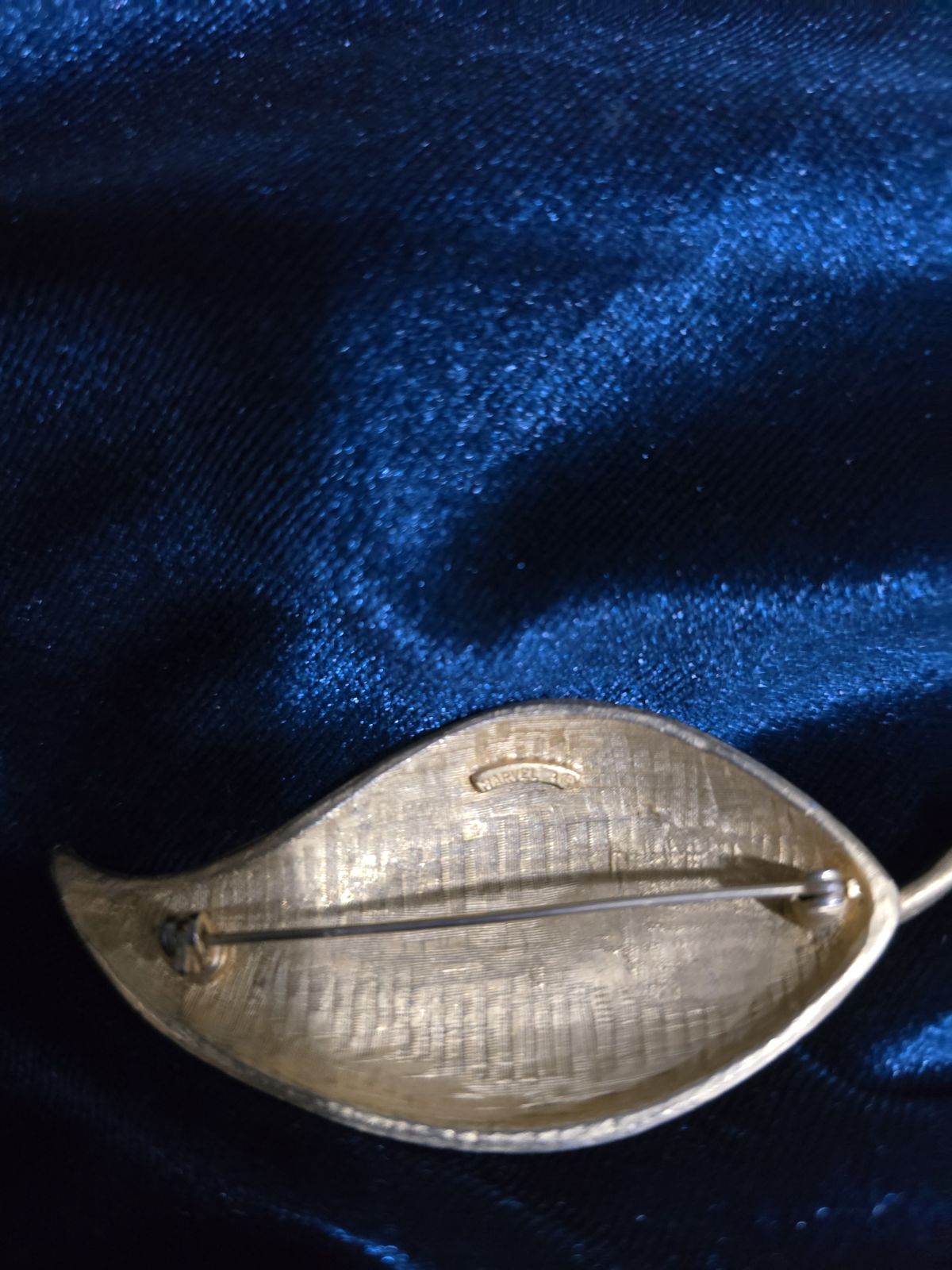 Signed Marvella gold-tone leaf brooch with blue enamel and rhinestones, view 2