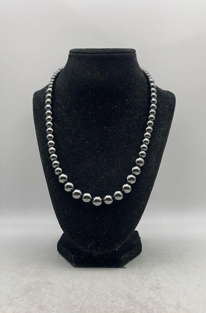 Graduated dark metallic bead necklace with silver spacers and lobster clasp, view 3
