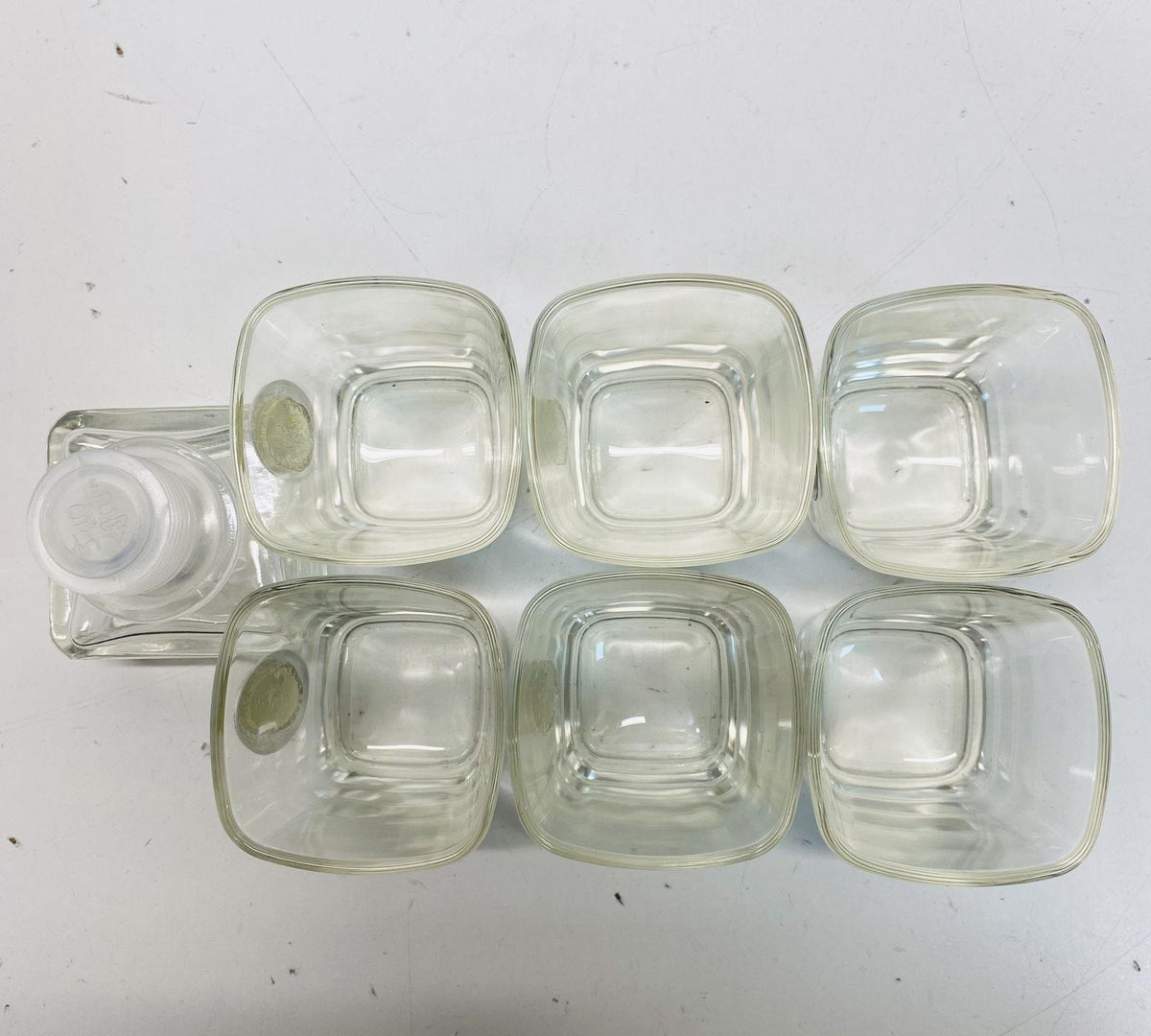 Faceted clear glass decanter with oval label detail, six shot glasses and white gift box, view 3