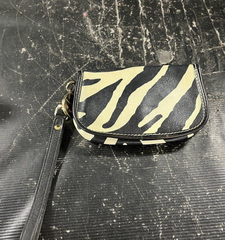AGE REVIEW Dooney & Bourke Zebra Print Leather Flap Wristlet with Gold Hardware
