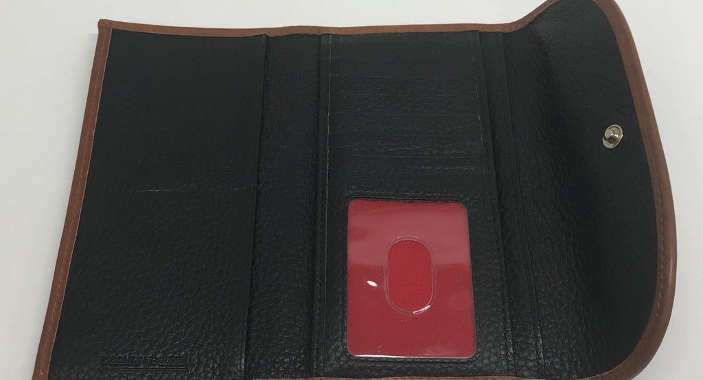 Dooney and Bourke Pebble Grain Clutch Wallet Black Leather with Brown Trim