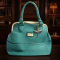 Carolyn Tucker Teal Pebbled Satchel Handbag with Gold Tone Frame and Dragonfly Charm