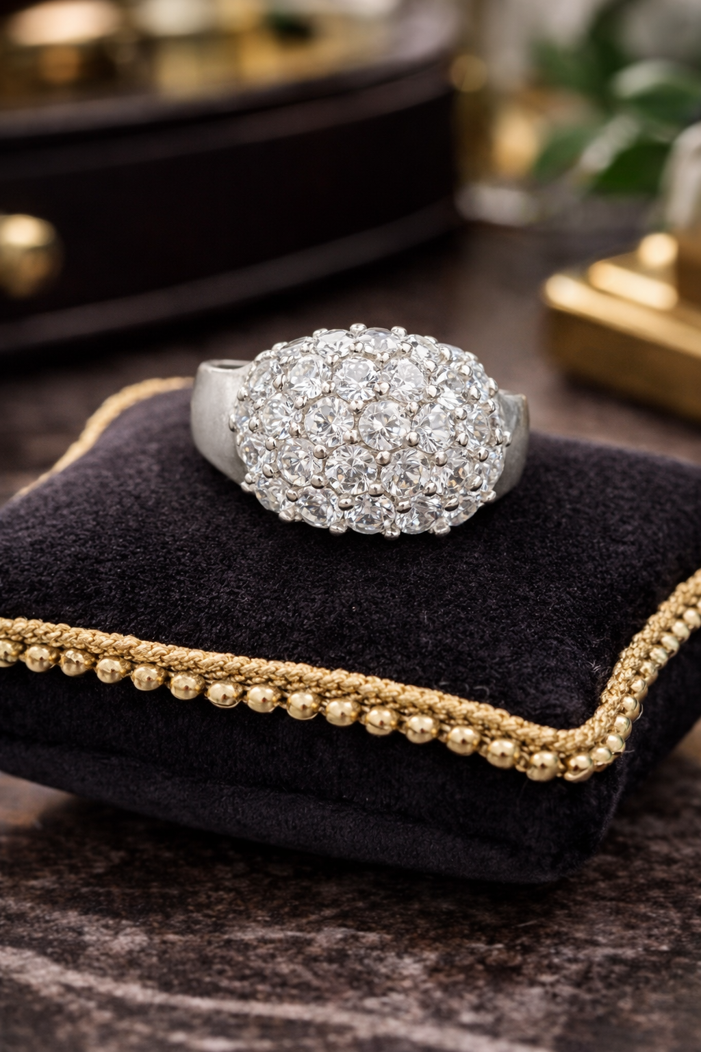 Dome cluster ring covered in clear pavé-style stones
