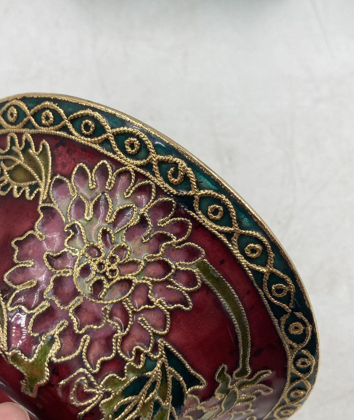 Small red bowl with ornate gold and floral decoration in a fitted box, view 2