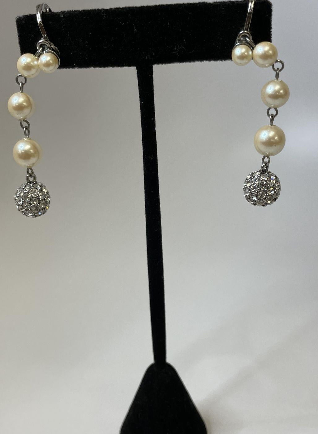 Silver-tone clip-on dangle earrings with faux pearl, rhinestone and beaded detail, view 7