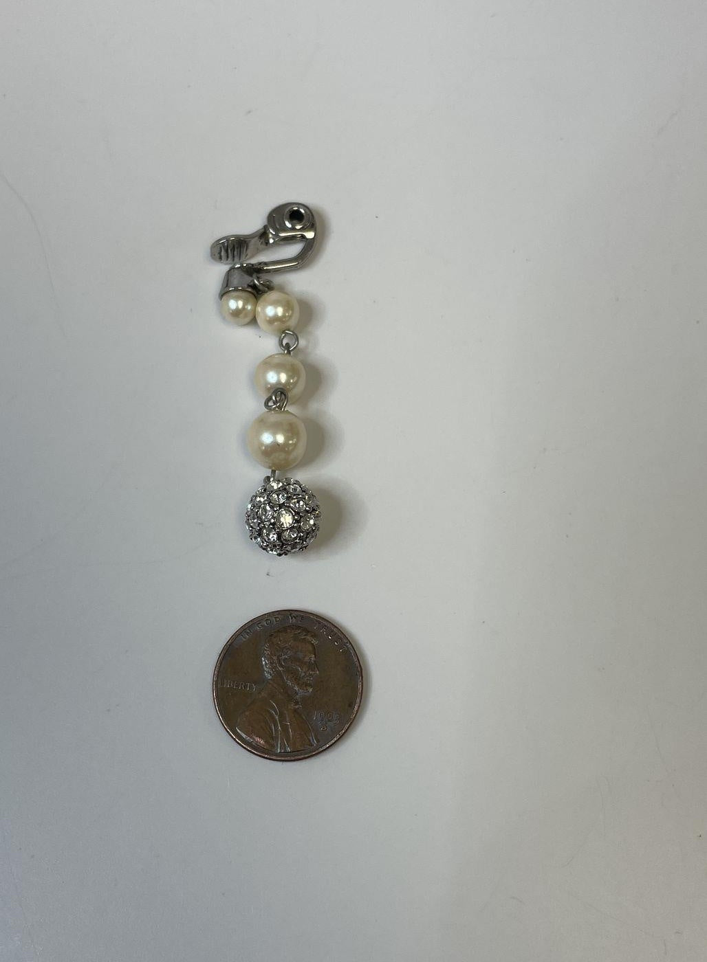 Silver-tone clip-on dangle earrings with faux pearl, rhinestone and beaded detail, view 4