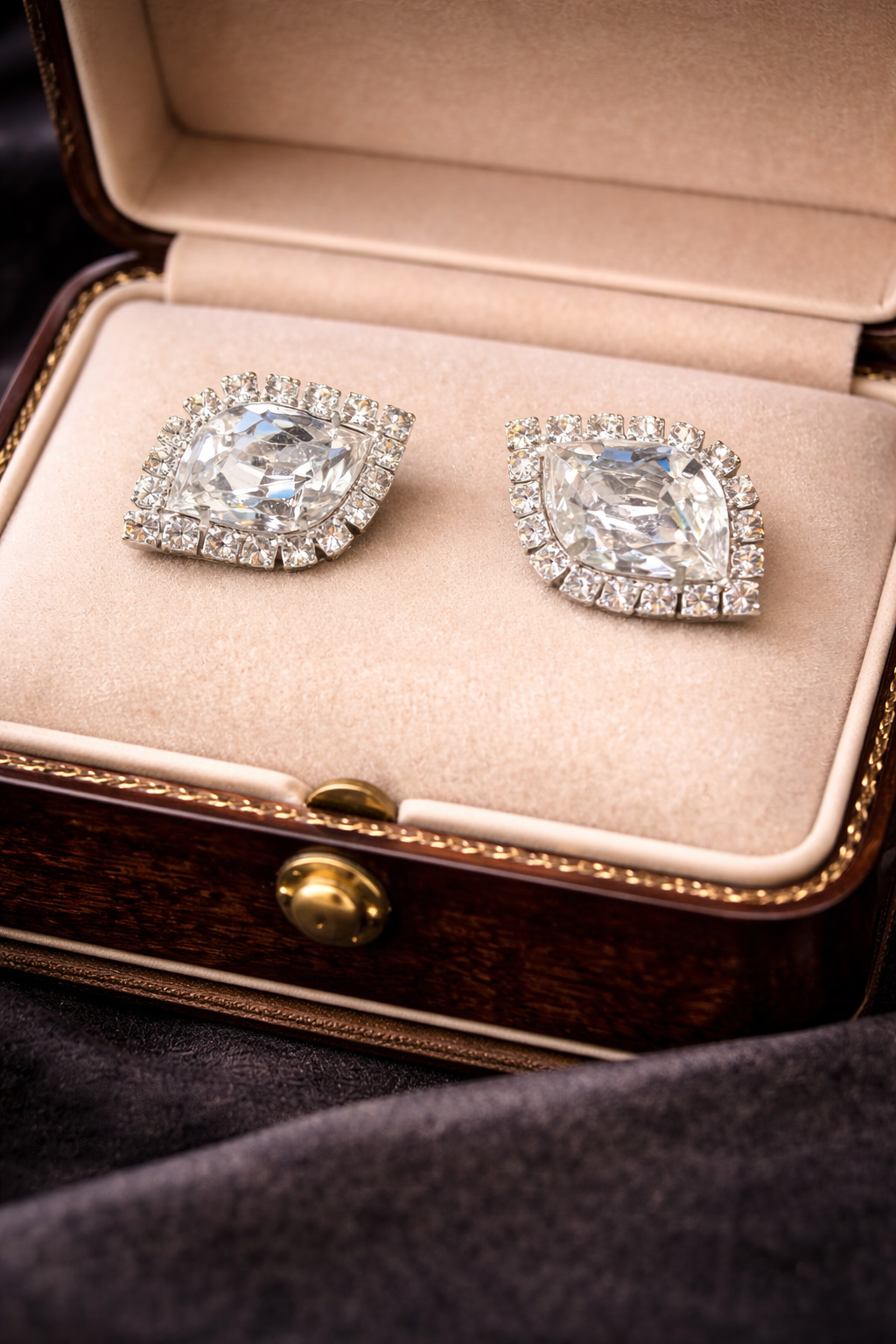 Weiss silver-tone clip earrings with marquise crystal center and round stone halo, view 4