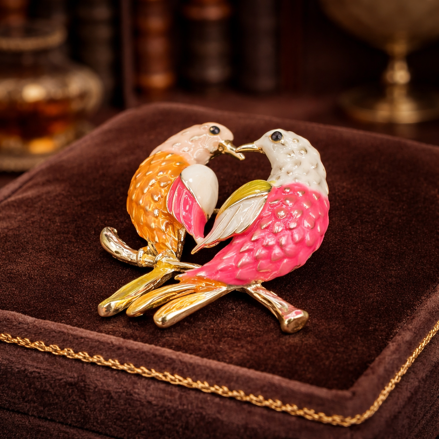 Gold-tone double lovebird brooch with pink, orange, yellow and white enamel