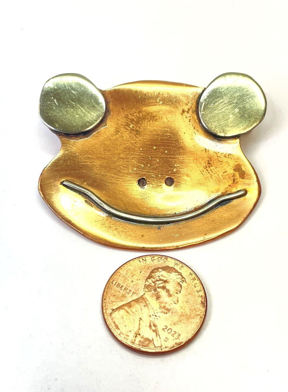 Copper-toned frog face brooch with silver-tone wire eyes and smile, view 3