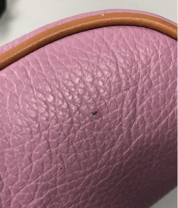 Pink lavender pebbled leather bucket-style crossbody bag with tan leather strap, view 7