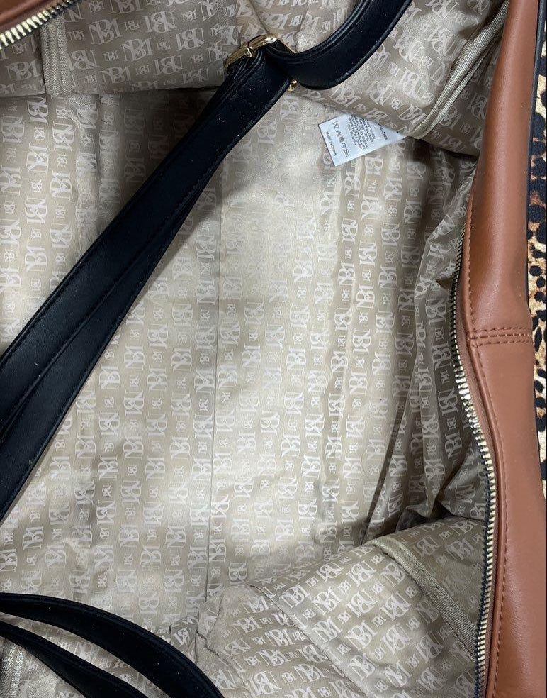 Leopard print vegan leather weekender bag with brown trim and black base, view 4