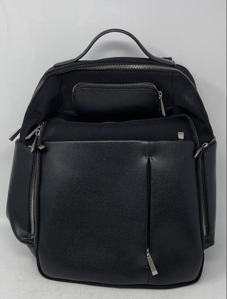 Barneys New York black backpack with adjustable straps, top handle and front zip pocket, view 6