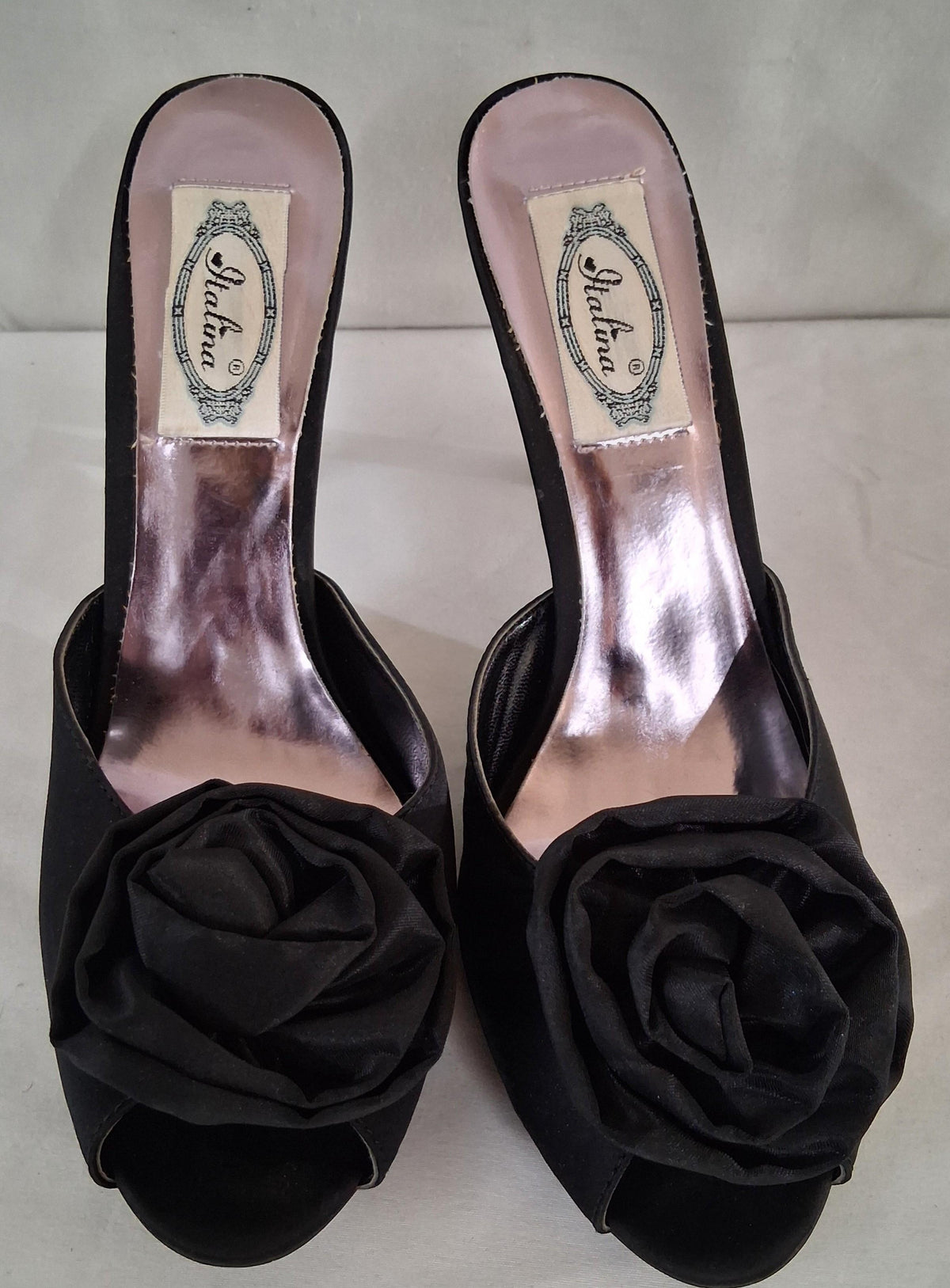 Italina black satin open-toe stiletto heels with floral rosette accents, view 2