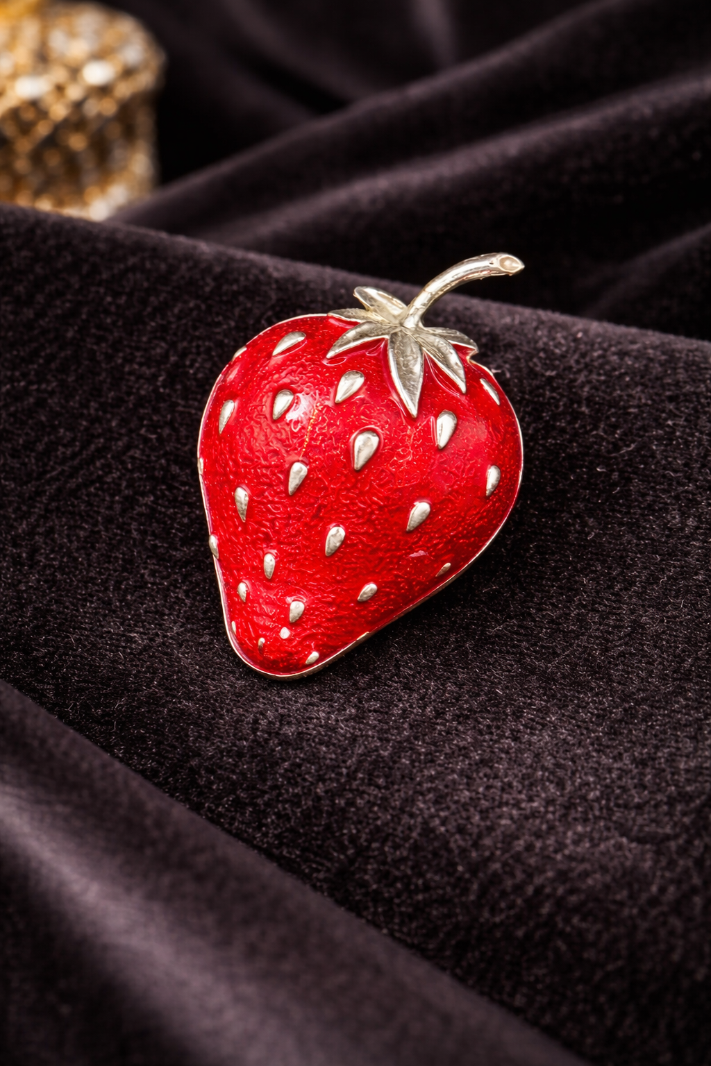 Silver-tone strawberry brooch with glossy red enamel and silver-tone seed details