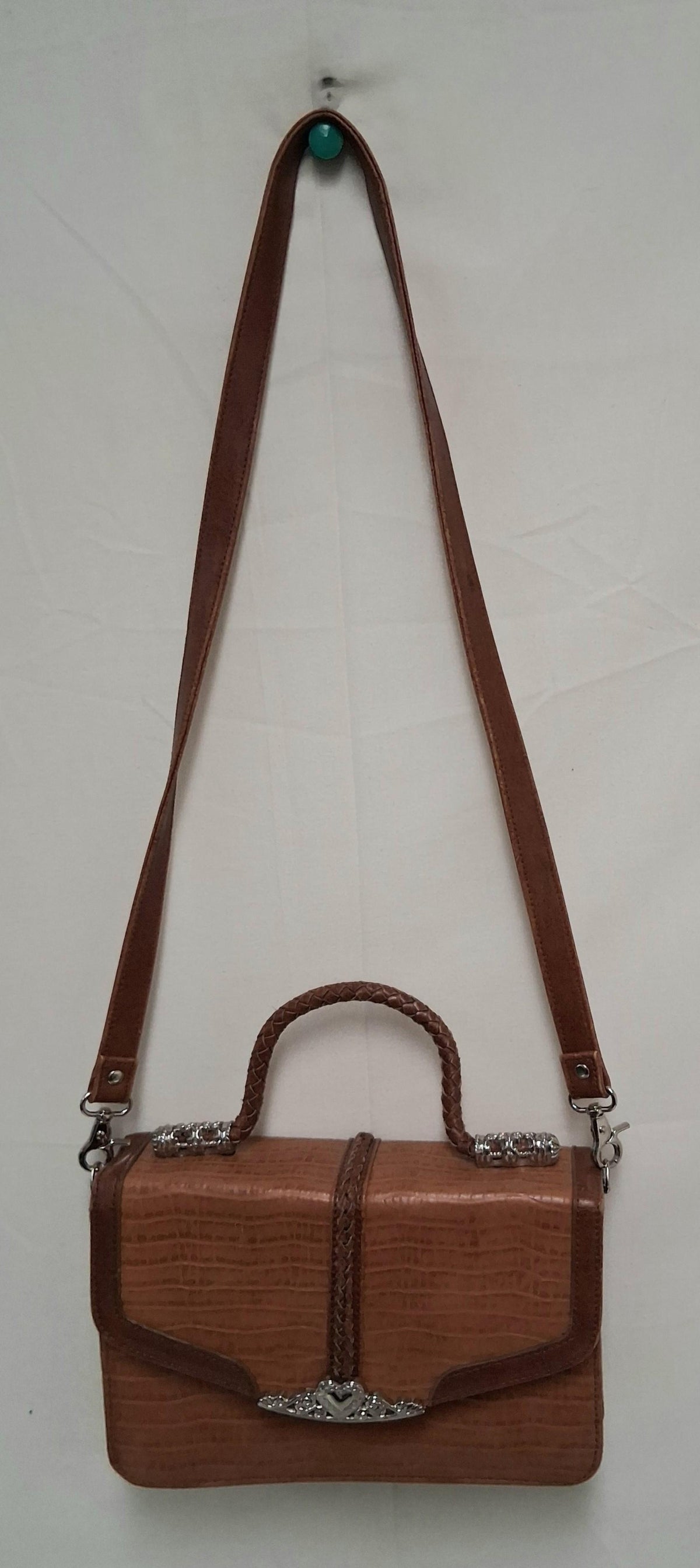 Brown embossed faux leather flap handbag with braided front detail and heart accent, view 6