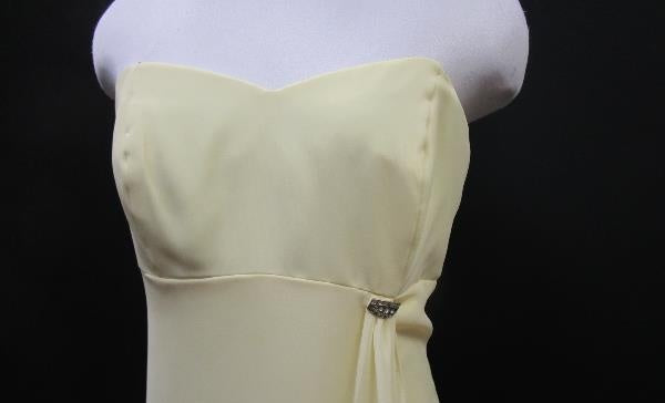 Soft yellow strapless formal gown with fitted bodice and rhinestone accent at the side waist, view 4