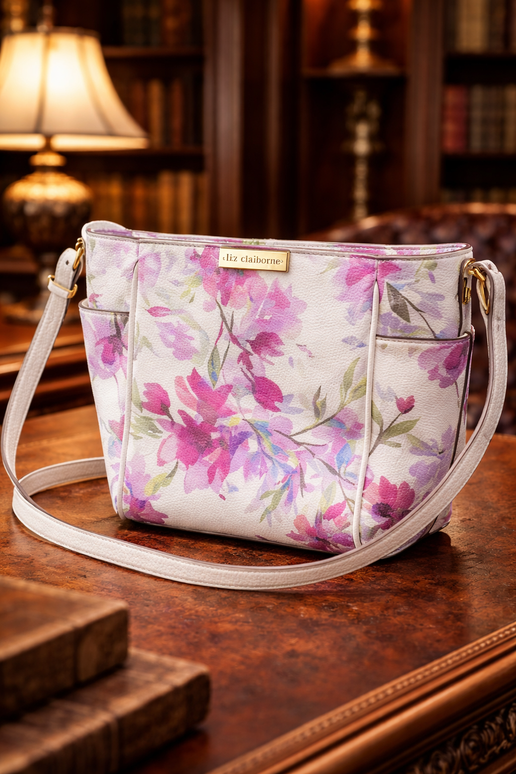 White crossbody bag with pink, lavender and green watercolor floral print