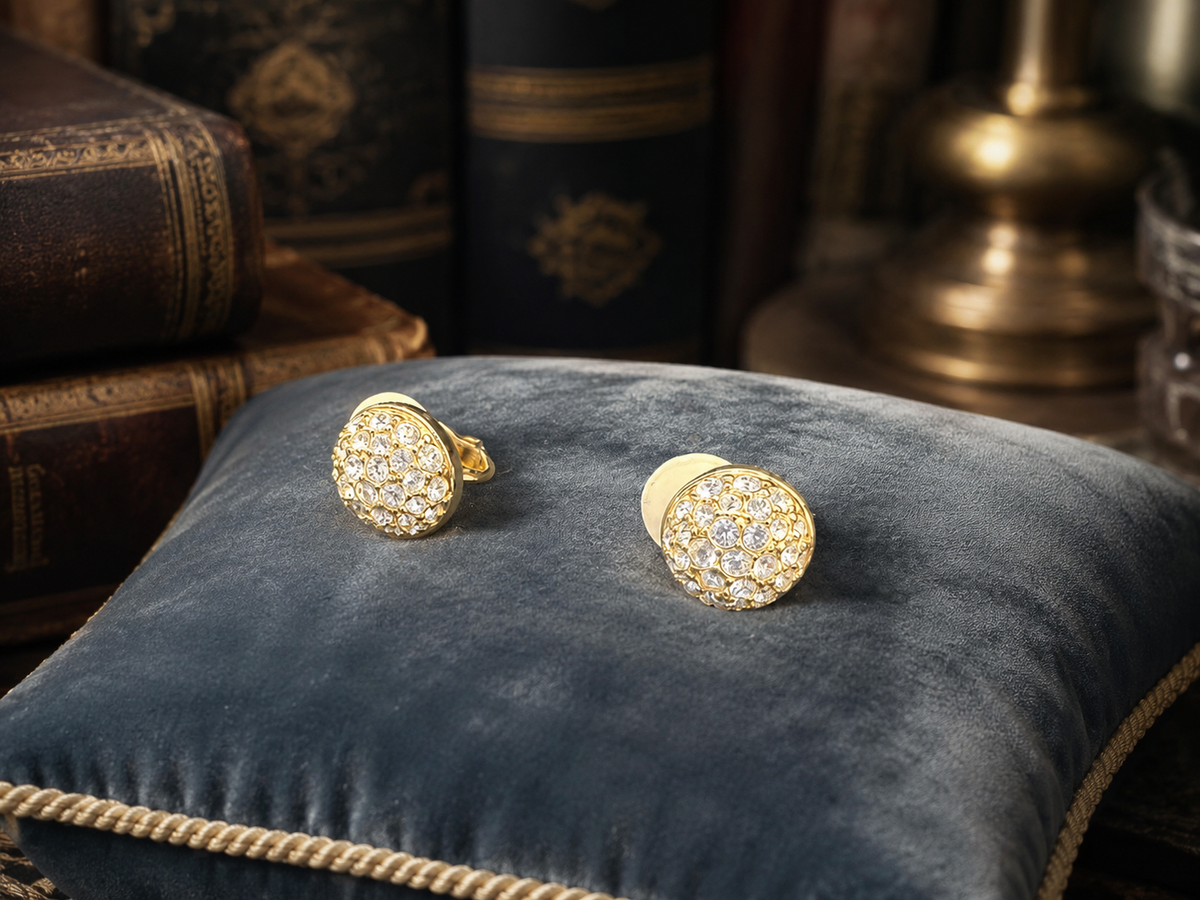 Signed Swarovski gold-tone dome button clip earrings with clear crystal accents, view 6