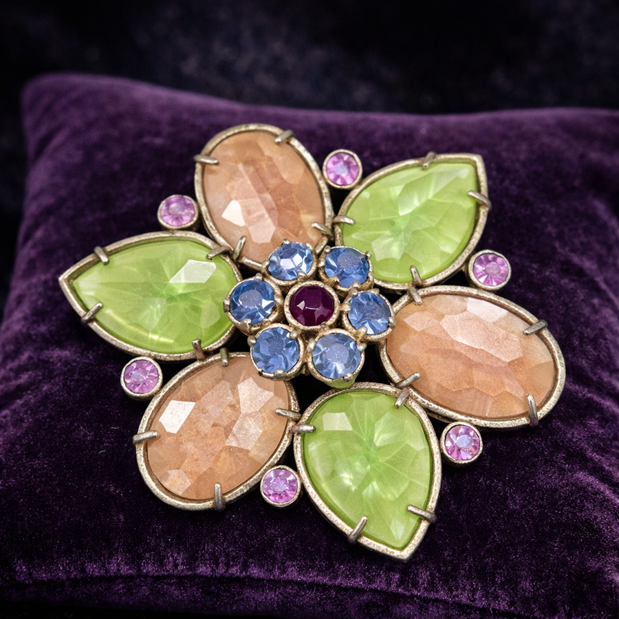 Six-petal flower brooch with pastel blush and light green petal stones and rhinestone center