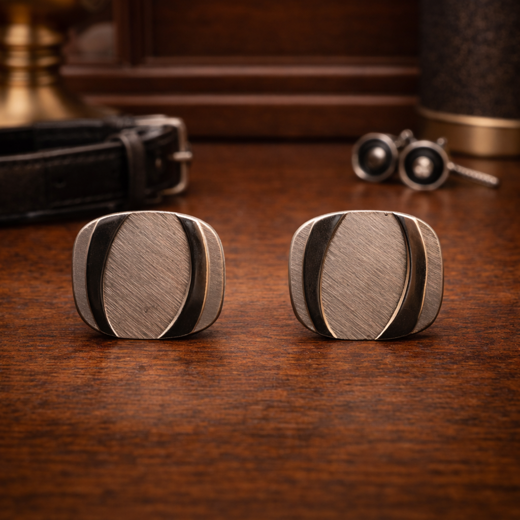 Vintage silver tone oval tie tack set with brushed textured panel design and chain back