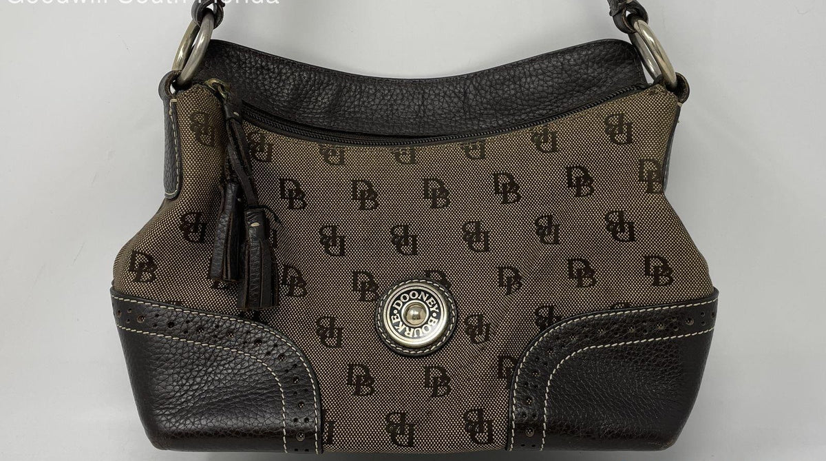 Brown signature canvas shoulder handbag with dark leather trim and tassel zipper pull, view 2