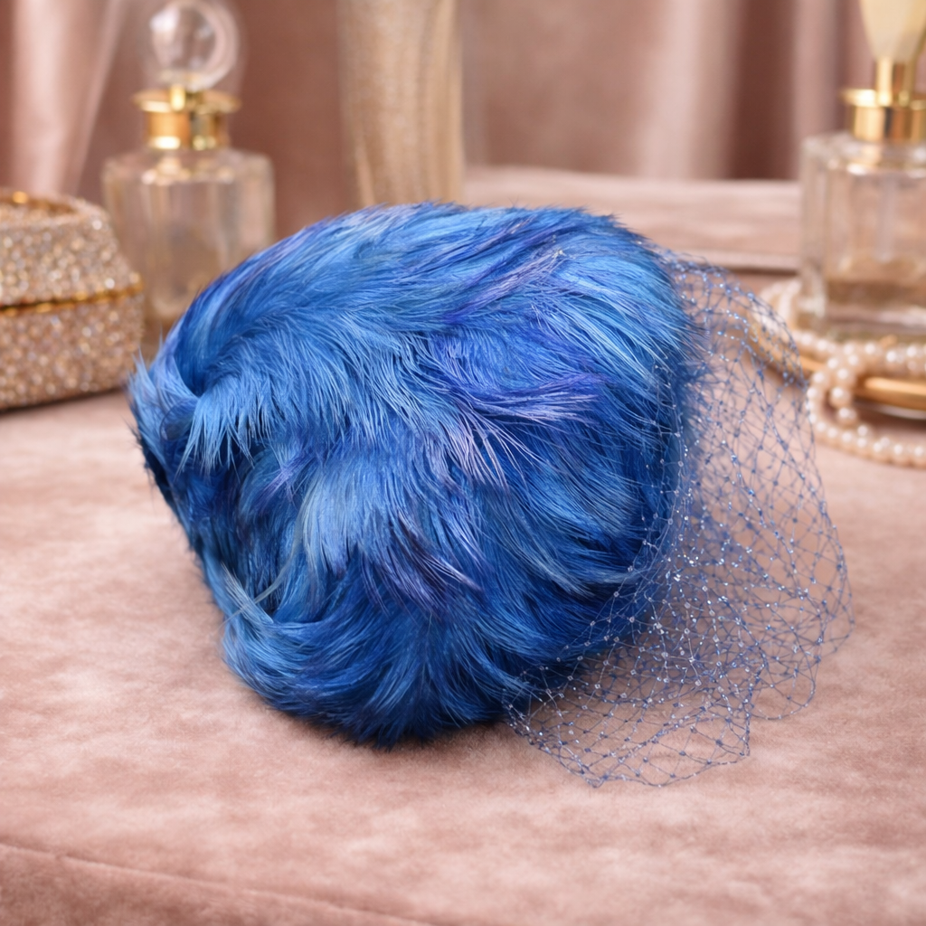 Lisa New York blue feather hat with net trim