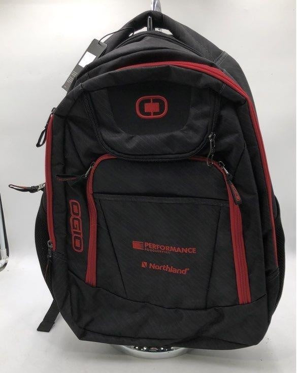 OGIO black backpack with red trim, padded shoulder straps and front zip pockets, view 2
