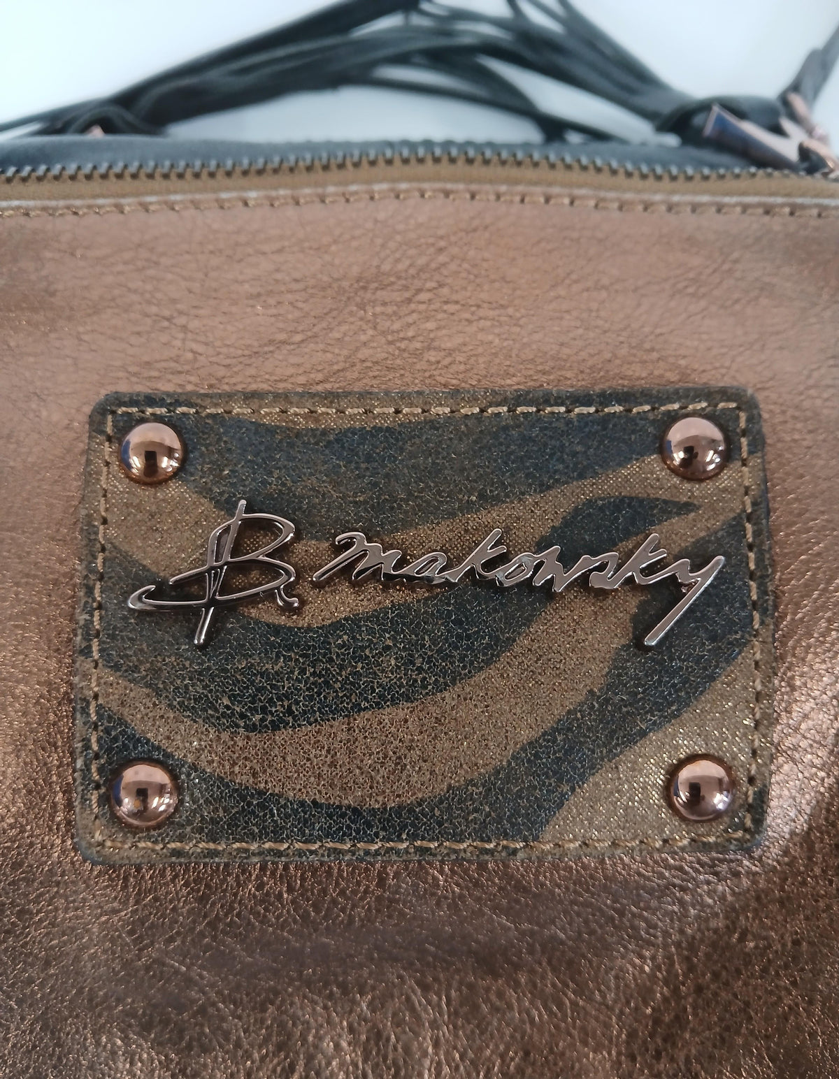 B. Makowsky brown and black crossbody bag with front logo plate and long strap, view 6
