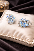 Vintage Silver Tone Blue Rhinestone Floral Clip On Earrings Aurora Borealis Crystal Cluster Statement