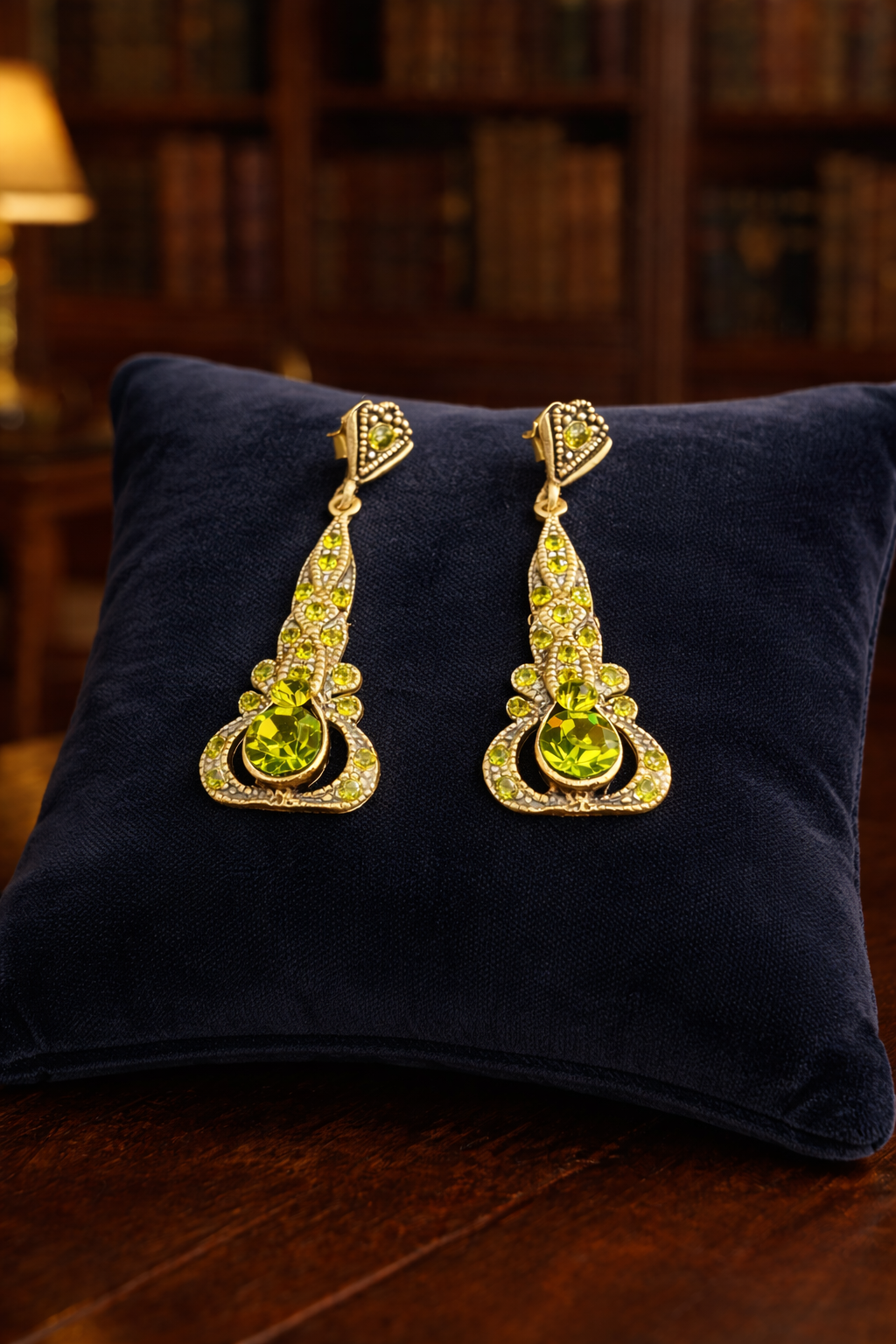Gold-tone openwork drop earrings with green crystals and clear pavé rhinestones