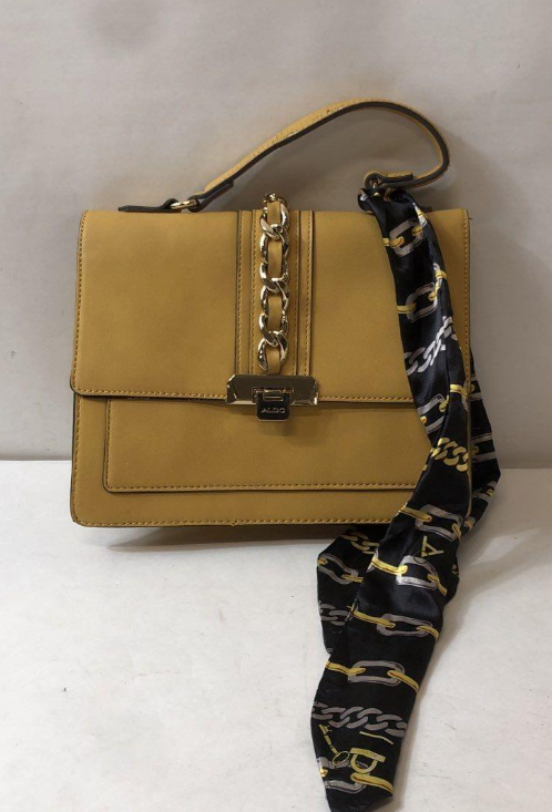 Mustard yellow structured flap shoulder bag with gold-tone chain clasp and scarf accent, view 2
