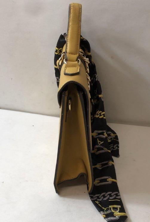 Mustard yellow structured flap shoulder bag with gold-tone chain clasp and scarf accent, view 3