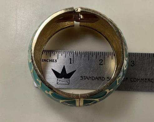 Gold-tone hinged cuff bracelet with turquoise-color enamel and scrollwork, view 2