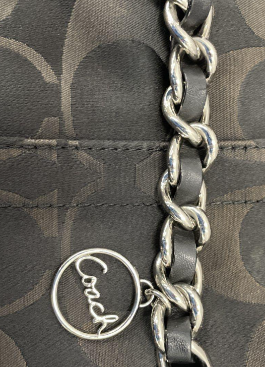 Coach Signature C black canvas crossbody with black leather trim and chain accent, view 7