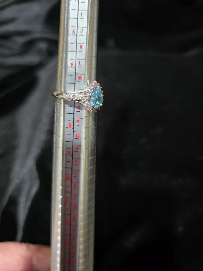 D'Joy silver-tone ring with blue center stone, pink-red halo and clear accent stones, view 5