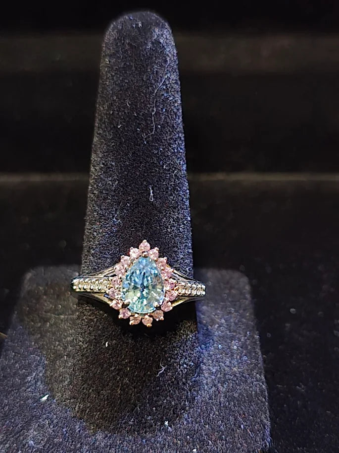 D'Joy silver-tone ring with blue center stone, pink-red halo and clear accent stones, view 3