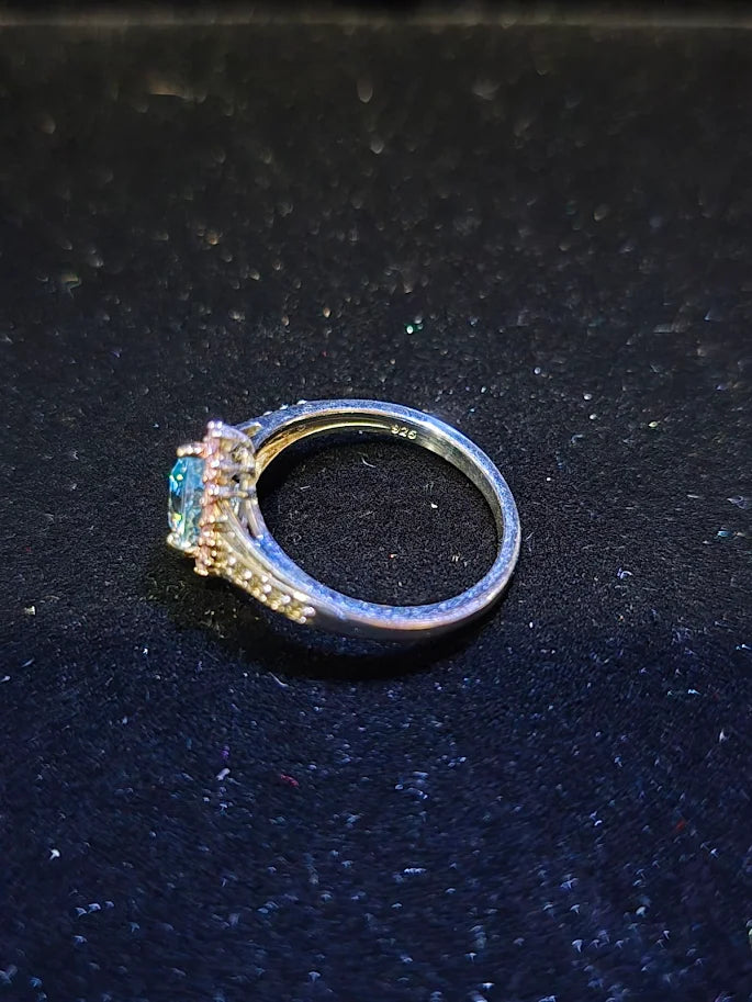 D'Joy silver-tone ring with blue center stone, pink-red halo and clear accent stones, view 6