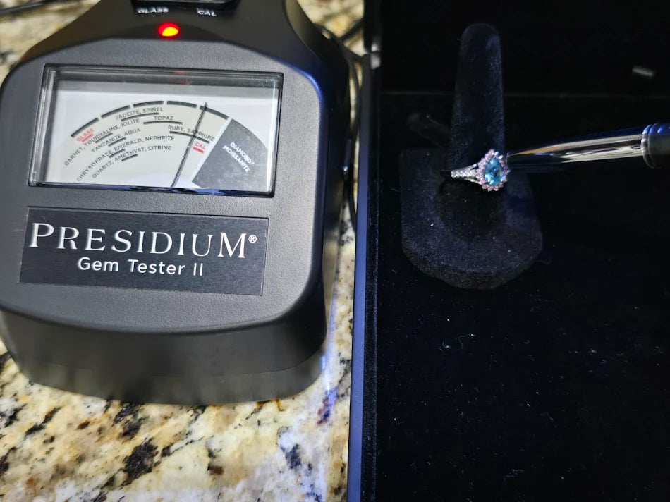D'Joy silver-tone ring with blue center stone, pink-red halo and clear accent stones, view 10