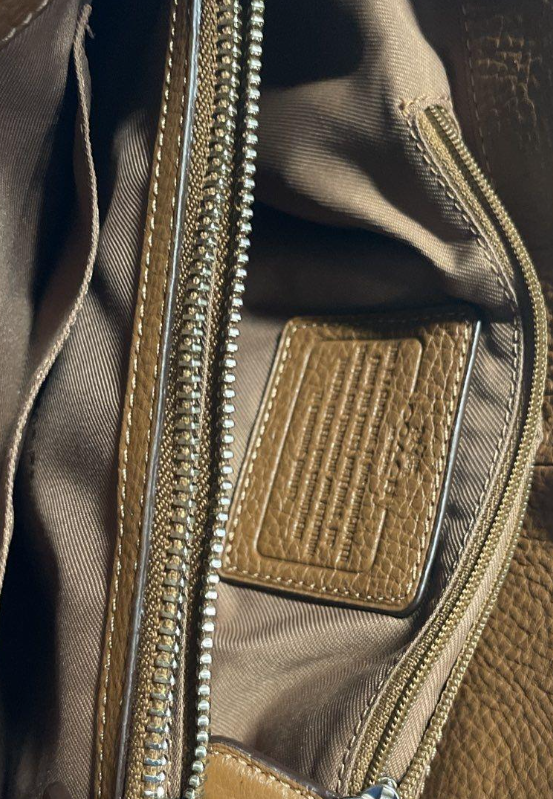 Brown pebbled leather carryall satchel with rolled handles and crossbody strap, view 3