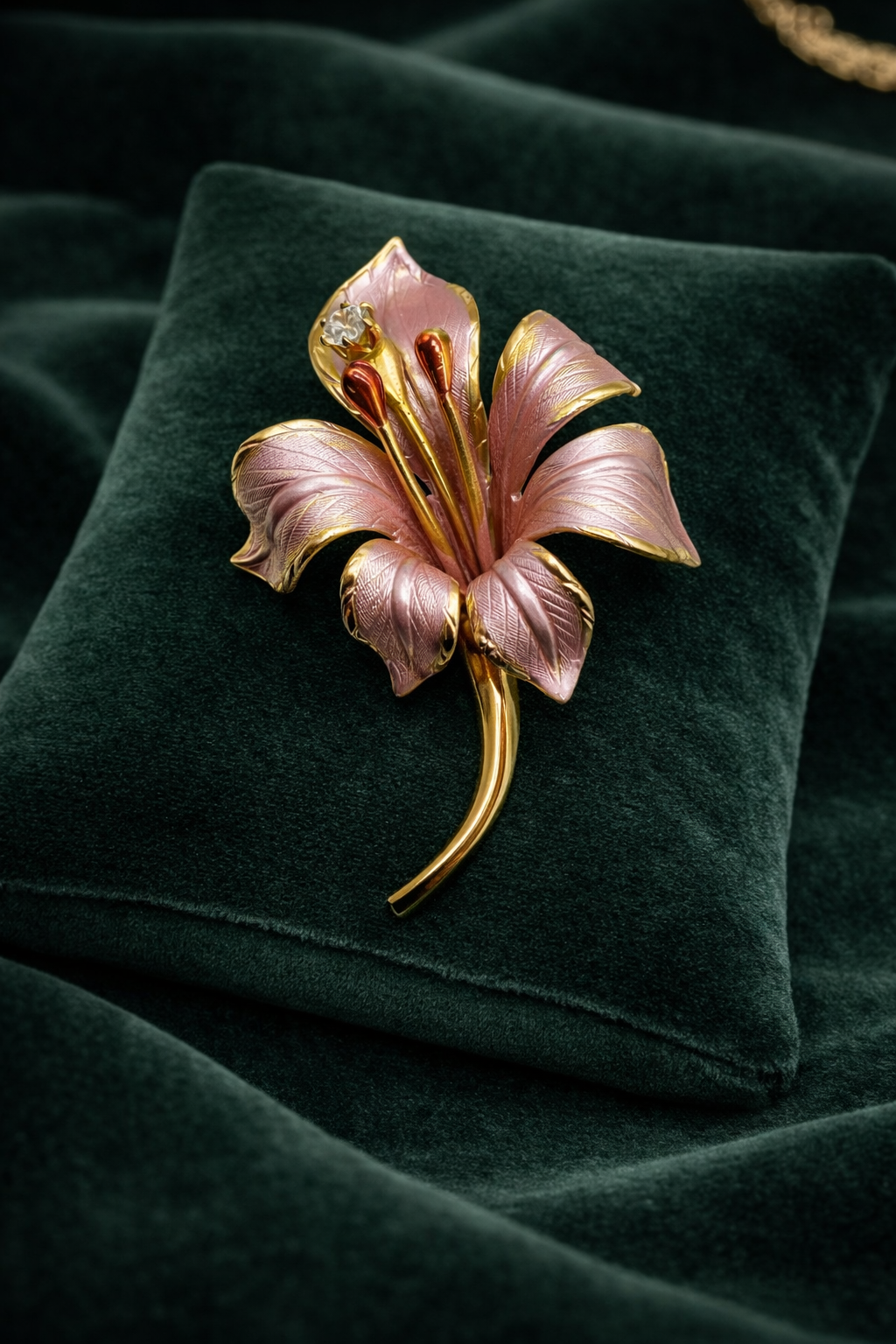 Signed Cerrito pink enamel lily brooch with gold-tone trim