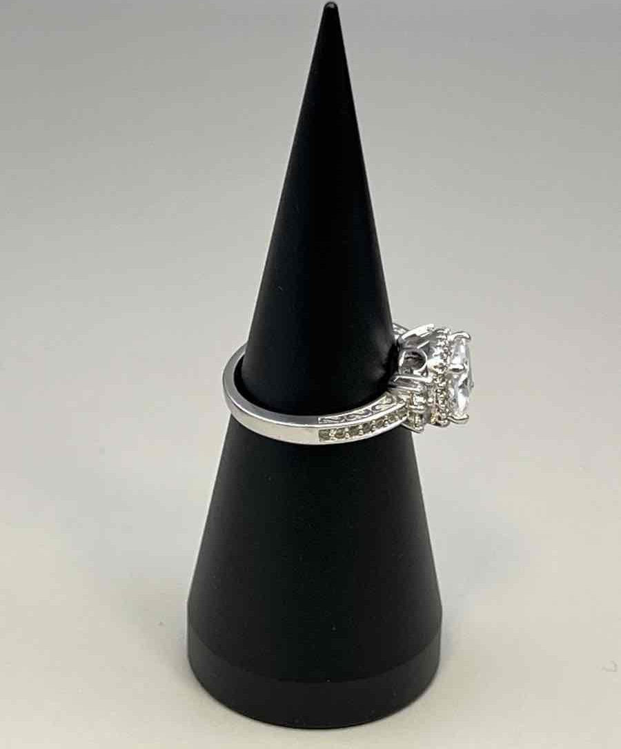 Silver-tone ring with large clear center stone and crystal accents, size 8.5, view 3