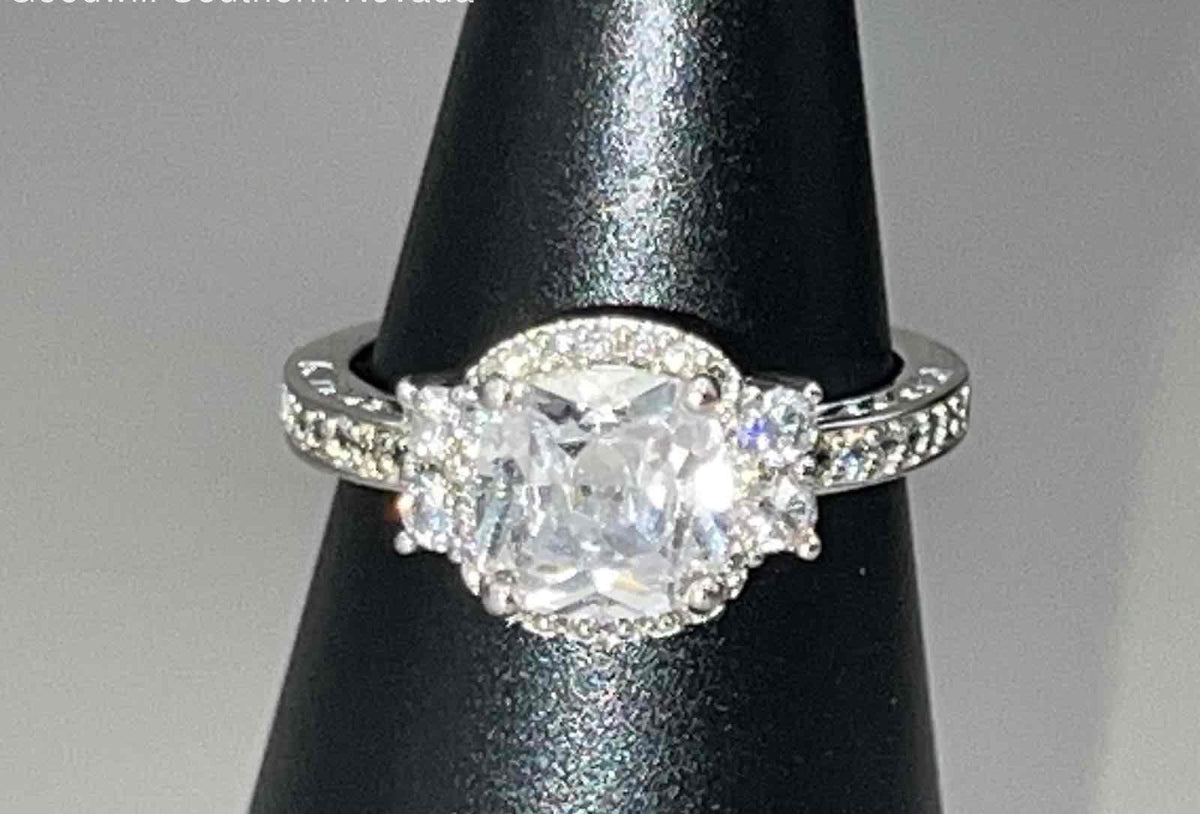 Silver-tone ring with large clear center stone and crystal accents, size 8.5, view 10