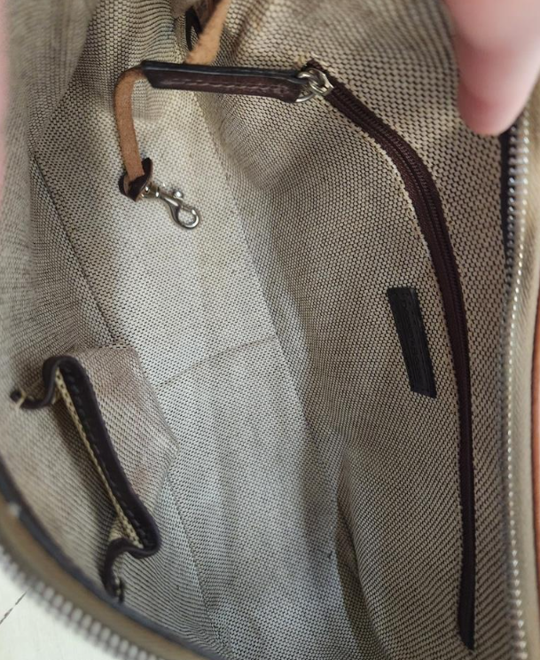 Dooney and Bourke 1975 tan pebbled leather east-west hobo with dark trim and duck charm, view 6