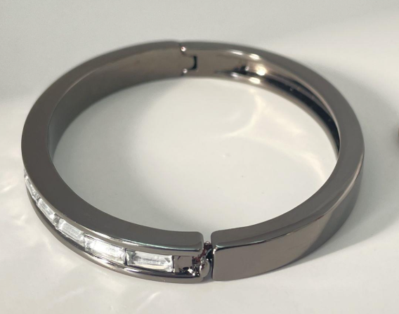 Signed Givenchy gunmetal-tone hinged bangle with channel-set crystal rhinestones, view 3