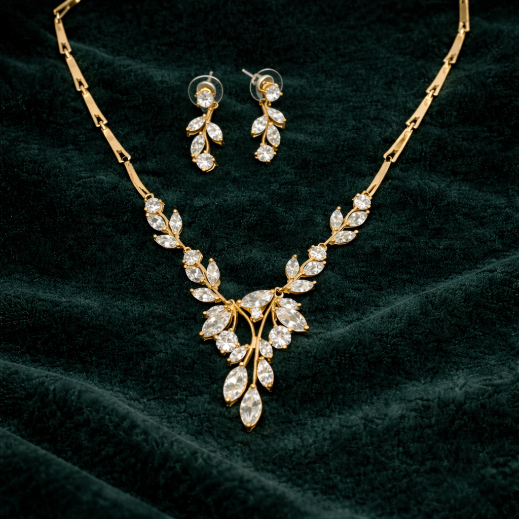Gold-tone bridal necklace and drop earring set with cascading cubic zirconia