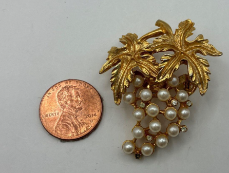 Gold-tone grape cluster brooch with cream faux pearls and textured vine leaves, view 5