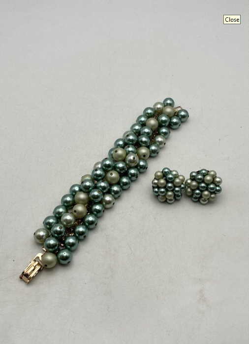 Two-tone green faux pearl multi-strand bracelet with matching cluster clip earrings, view 5
