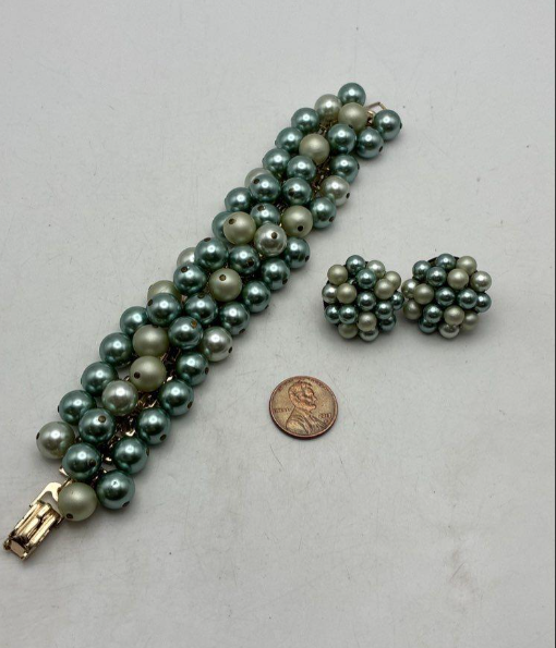 Two-tone green faux pearl multi-strand bracelet with matching cluster clip earrings, view 2
