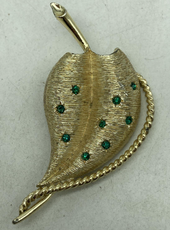 Gold-tone leaf brooch and matching clip-on earrings with green rhinestones, view 2