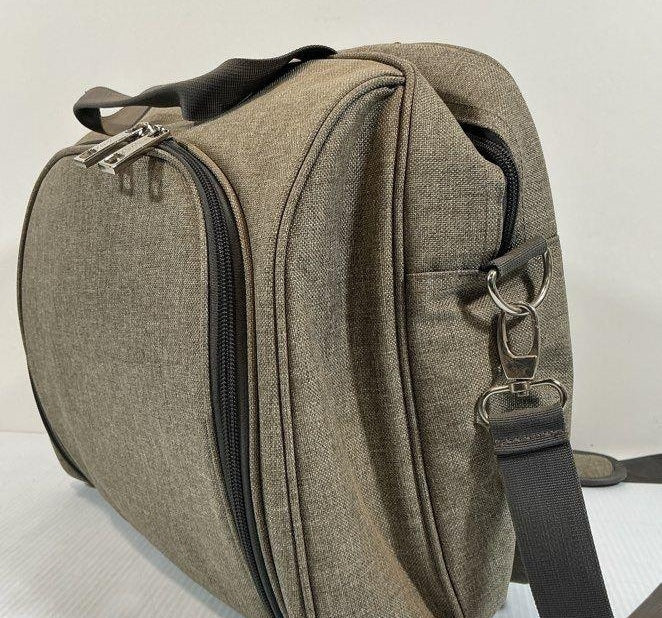 Taupe fabric picnic backpack with tableware fitted in the front compartment, view 8